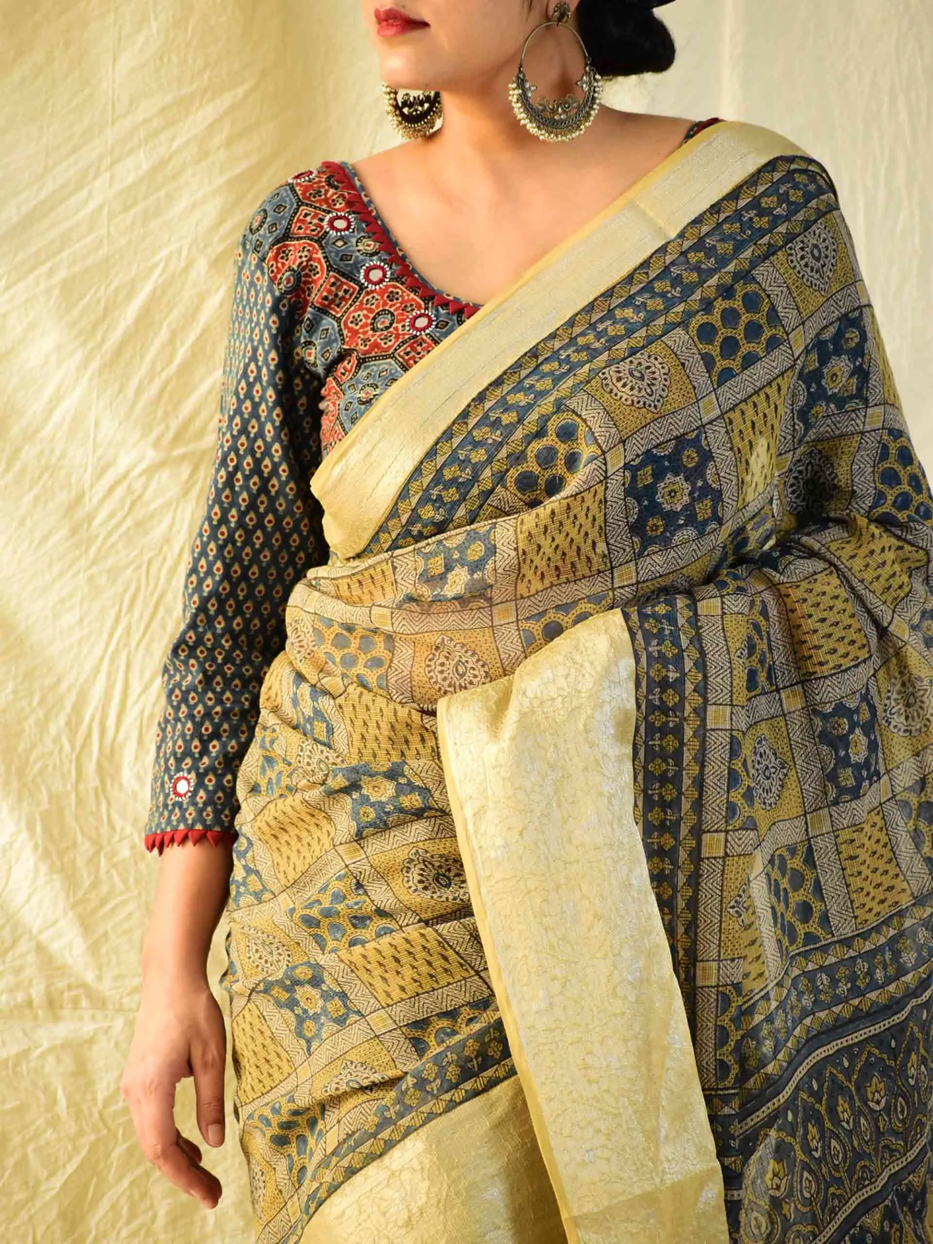 Kaynaat - Ajrakh handloom Kota Doria saree with zari border